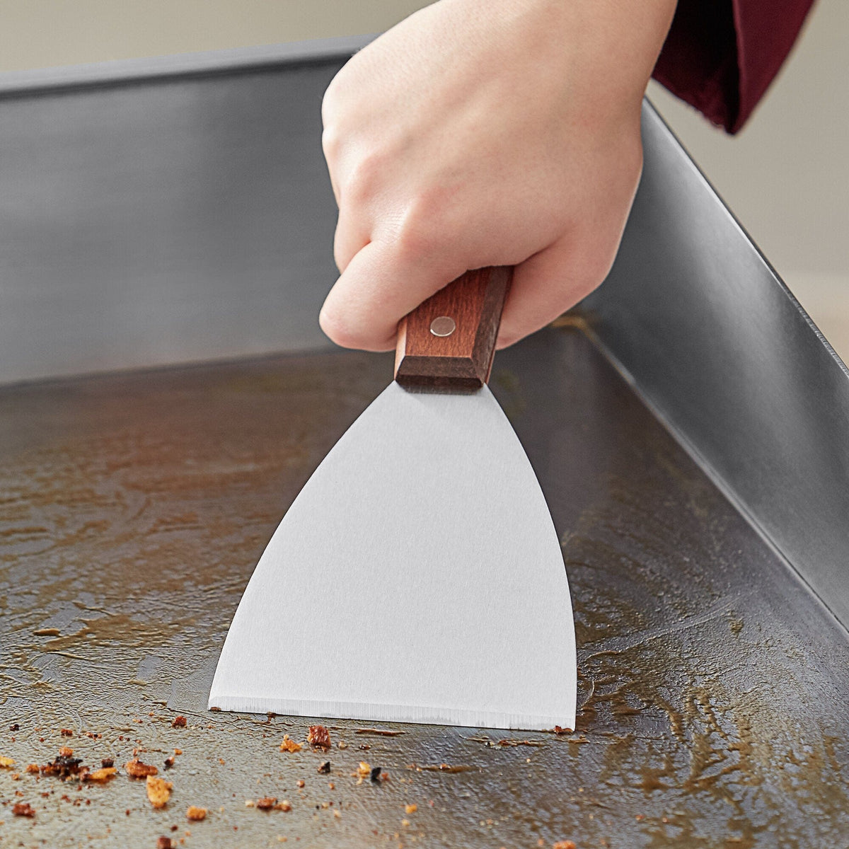 Tablecraft 4 inch Stainless Steel Grill Scraper with Wood Handle Expertly slide burgers, bacon, eggs, or buns off of your grill with this Tablecraft 4 inch blade grill scraper with wooden handle-254 Hannah's Variety Store