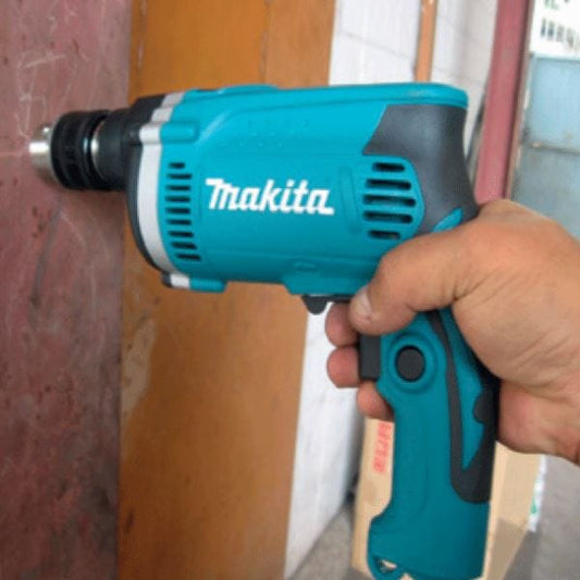 Makita High Impact Electric High Power 710 Watts Hammer Drill with rubberized soft grip, Ergonomically designed for comfort - HP1630X MEGA