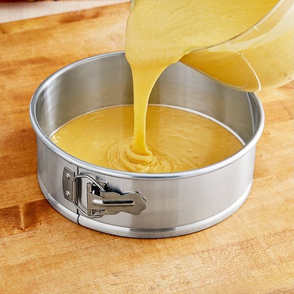 Royal Industries 9 inch x 3 inch Natural Finish Aluminum Springform Cake Pan   Try this 9 inch x 3 inch aluminum springform pan for cheesecakes, battercakes, and other specialty items-ROYSFP0903 Hannah's Variety Store