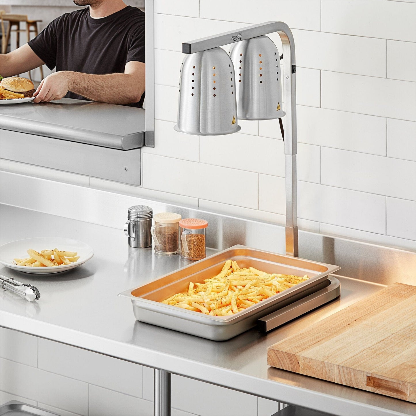 Two Bulb Food Warmer 110V with two 250 Watt Bulbs  This warmer boasts a simple design that combines with a rugged construction to give you a reliable way to keep fried foods hot without drying them out-ROY FW 01 Hannah's Variety Store