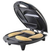 Brentwood 4-Portion Empanada Maker, a nonstick cooking surface for easy cleaning and cool-touch handles - AR140