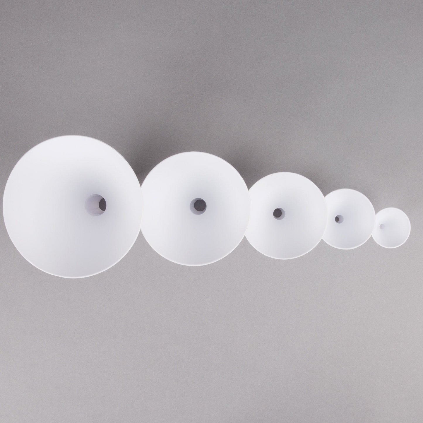 Tablecraft  5-Piece White Plastic Funnel Set This Tablecraft 5 white plastic funnel set is a necessity for any kitchen or restaurant-TABL-5 Hannah's Variety Store