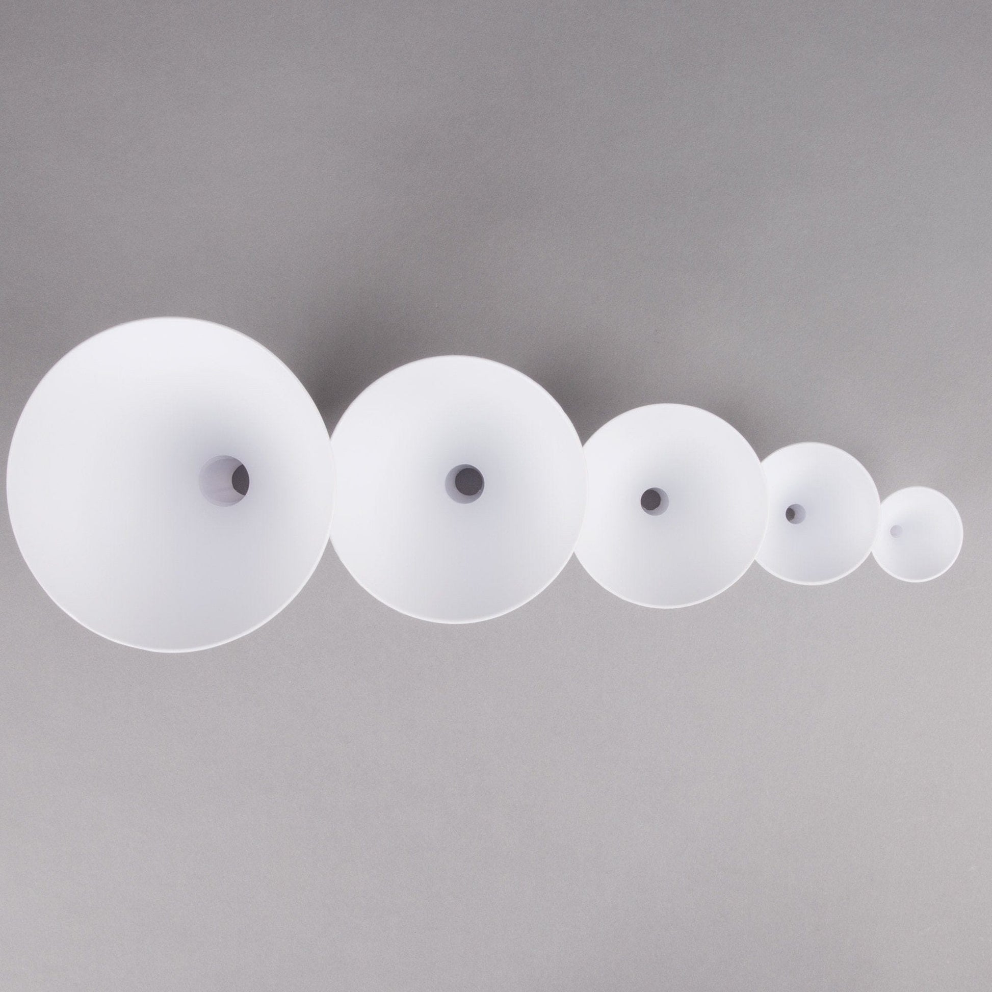 Tablecraft  5-Piece White Plastic Funnel Set This Tablecraft 5 white plastic funnel set is a necessity for any kitchen or restaurant-TABL-5 Hannah's Variety Store