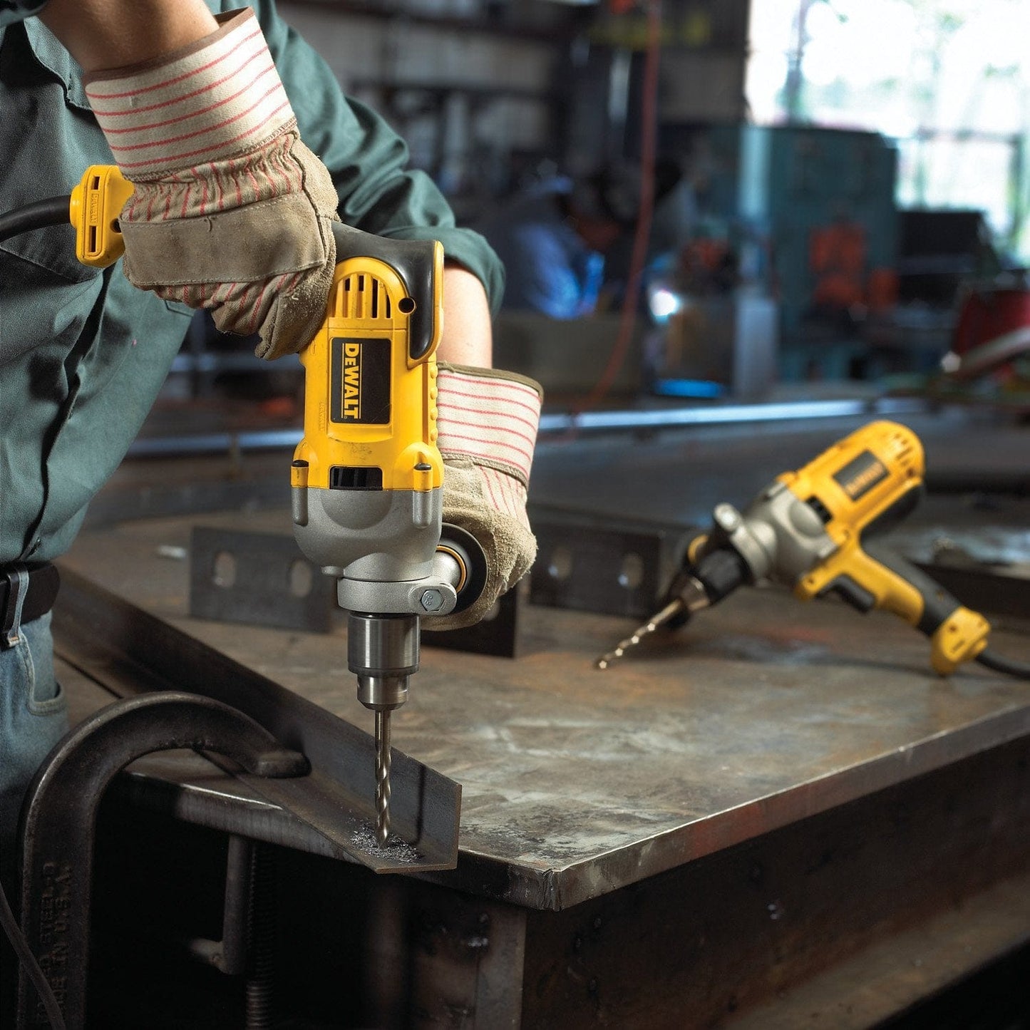Dewalt 1/2 IN. (13 MM.) 1200 Watts Variable Speed Reversible Pistol Grip Drill - functions well for both steel and wood applications, when working with a spade or auger bit in wood, it offers a 1-1/2-inch capacity - DWD210G MEGA