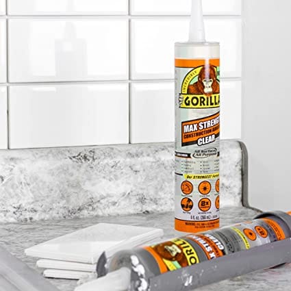 Gorilla Max Strength Clear Construction Adhesive, 9 ounce Cartridge, (Pack of 1) BONDS: Glass, Ceramic, Stone, Tile, Wet Surfaces, Landscaping, Decks, Trim/Molding, Metal, and More!- 8212302 MEGA
