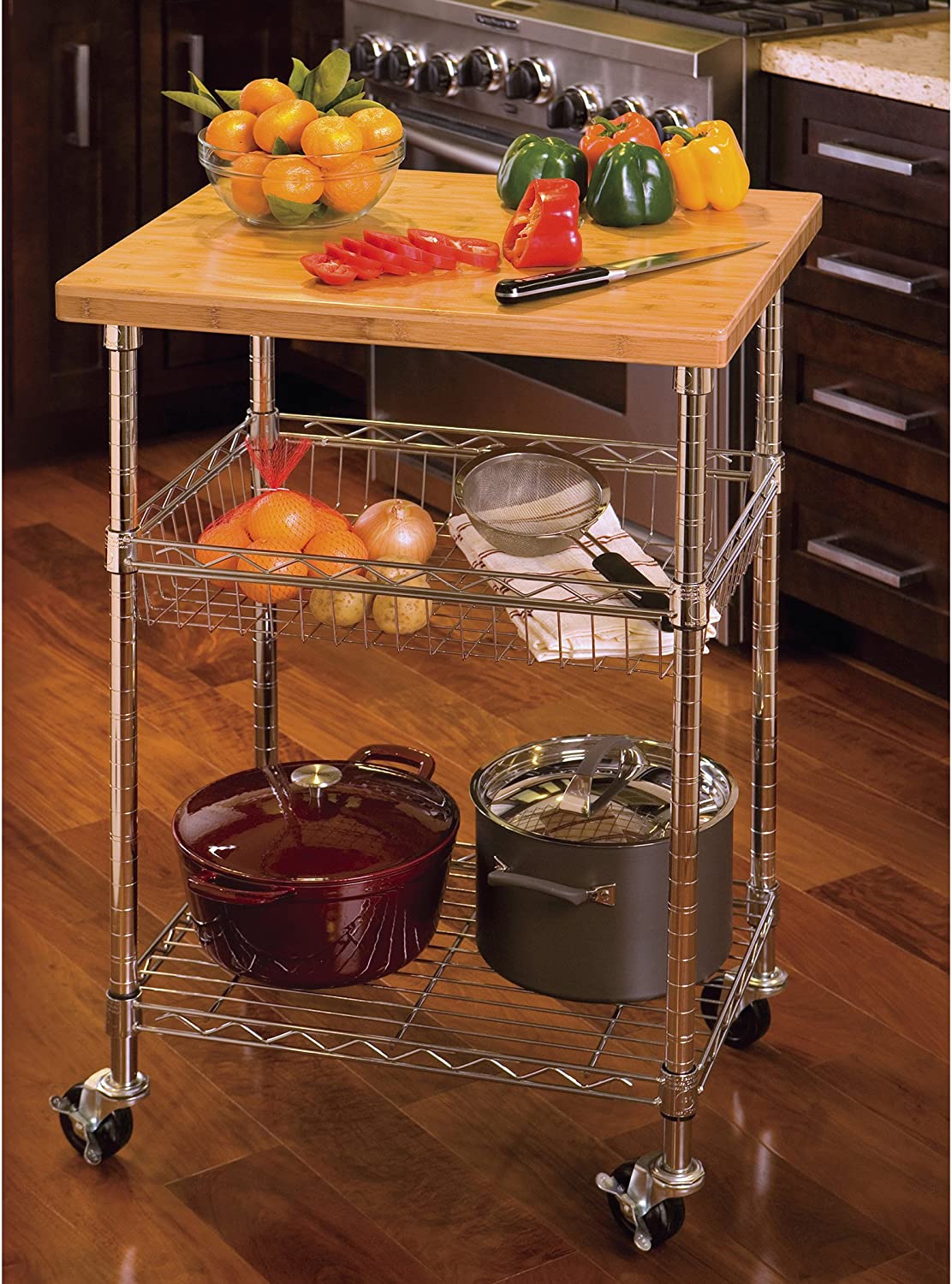 Seville Classics Chef's Rolling Table Bamboo  A practical industrial kitchen table, it has four 3 inch casters, two of which are lockable, a bottom shelf, a solid bamboo top, perfect for cutting, chopping and food processing-6829