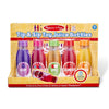 MELISSA & DOUG  Tip & Sip Toy Juice Bottles: Pretend to pour refreshing drinks, and watch as the liquid in these five durable plastic juice bottles - M&D-9466