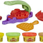 HASBRO  Playdoh Foodie Favourites Assorted: This play food set comes with 6 tools to shape a Play-Doh pizza crust, create pretend toppings, slice it up, and show off your creation to friends - E6686 ebuystt