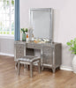 Leighton Vanity Desk And Stool Metallic Mercury Collection: Add Modern Glamour With This Vanity Desk And Stool Set, Etched Mirror Panel Along The Sides Of The Stool And Vanity Front Reflect Light Beautifully Throughout A Space. Leighton SKU: 204927