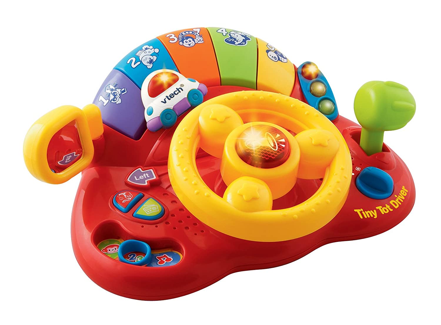V-TECH  Tiny Tot Driver: Moving car visits different parts of town, school, park, zoo, beach, and home. Lots of interactive buttons including radio, horn, and turning wheel - 111603