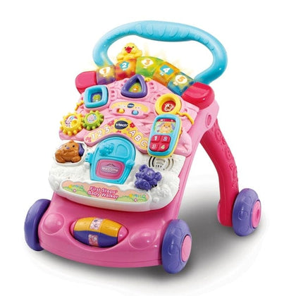 V-TECH First Steps Baby Walker Pink: This 2-in-1 baby walker and activity centre is designed to help tots find their balance - 505653