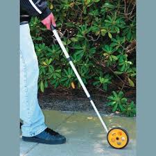Worksite Digital Display Measuring Wheel  with Pistol Grip. Balanced In-Line Design. Tri-Fold Handle with Pistol Grip. Sealed roller bearings; Hi-traction tire. Measures to 32,800 Feet(9,999 Meters). Belt driven counter for long life -WT4104" mega