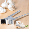 Royal Industries 7 inch Aluminum Garlic Press  This garlic press features pressing nubs that force the garlic through a stainless steel blade. It is extremely easy cleaning and won't leave your hands smelling like garlic all day-ROY GP