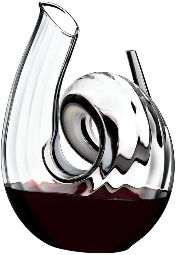 Riedel Decanter Curly Fatto A Mano lets you decant a young bottle of Cabernet for an enhanced flavor. Made from fine crystal, this carafe has a quirky curl shape that is great to use for everyday or a special occasion - 2011/00 Pie's Variety Store